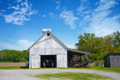 White Barn with farm equipment- Carrol County, Indiana