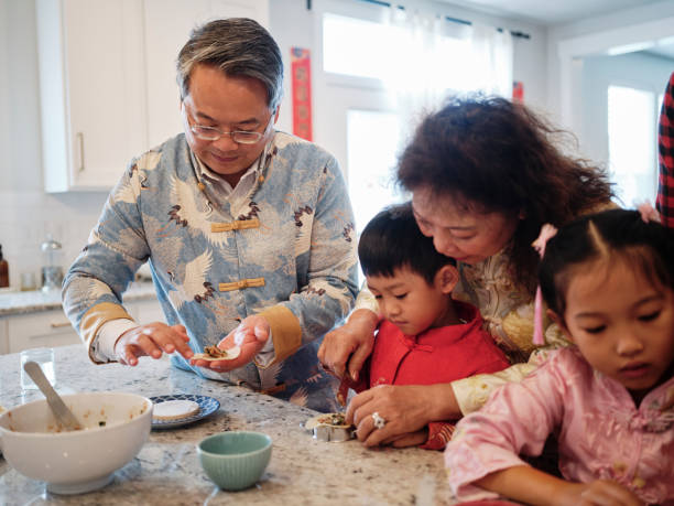Chinese Family Making Jiaozi Dumplings