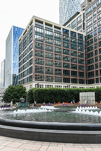 London, UK, 28 August 2023: Cabot Square in the modern Canary Wharf quarter with its banks and skyscrapers, London