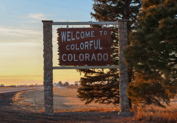 istock Colorado welcome sign at dusk 2013781104