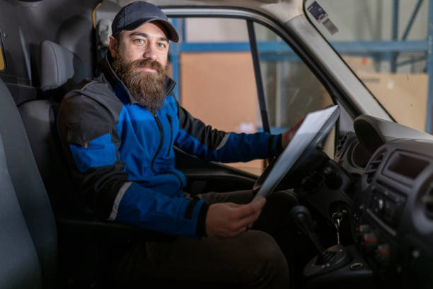 istock Portrait of warehouseman with list checking delivery 2013810162