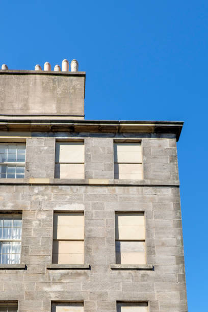 istock Blocked up windows on a stone walled building, Edinburgh, Scotland 2013839728