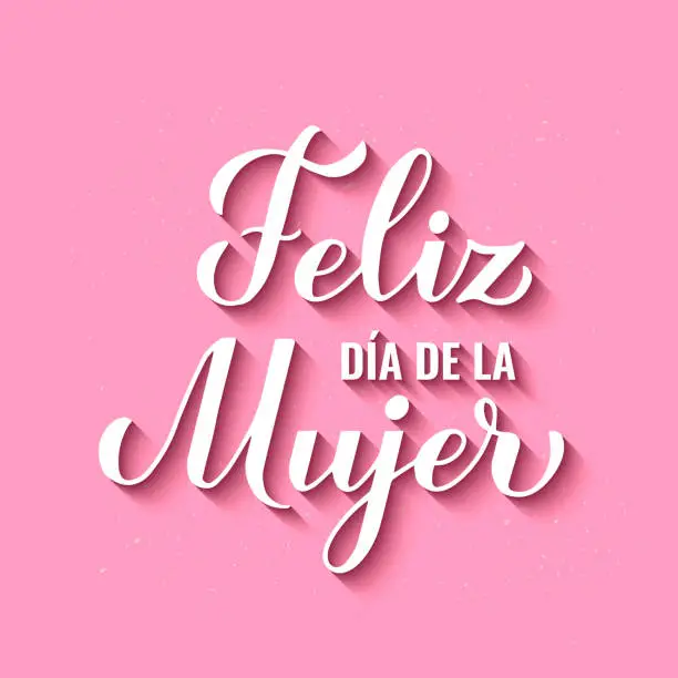 Vector illustration of Feliz Dia de la Mujer - Happy Womens Day in Spanish. Calligraphy hand lettering on pink background. International Womans day typography poster. Vector template, banner, greeting card, flyer, etc.