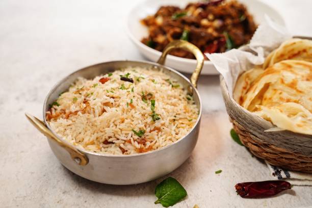 istock Kerala beef fry roast served with parotta and ghee rice 2013844421