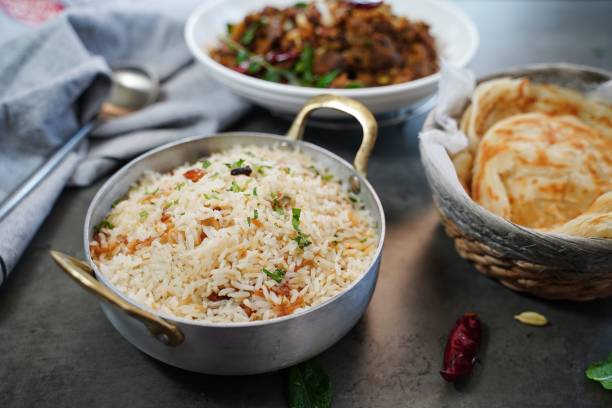 istock Kerala beef fry roast served with parotta and ghee rice 2013844423