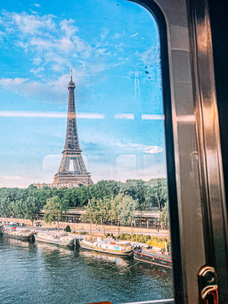 istock Eiffel Tower View from the Train Crossing River Seine in Paris 2013844452
