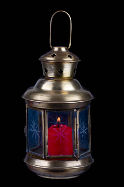Retro vintage candle brass lantern isolated on white background