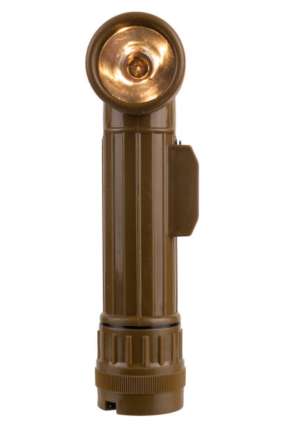 istock vintage military style flashlight with yellow light isolated on white 2013864818