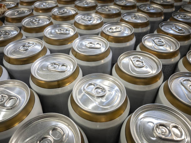 istock Selective bur on aluminum cans, beer cans, stacked and packaged in a warehouse, ready for shipment and logistics expedition in a soda and beverage production facility. 2013902801