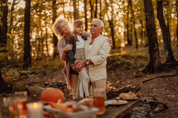 istock Family having a picnic in woods 2013933215