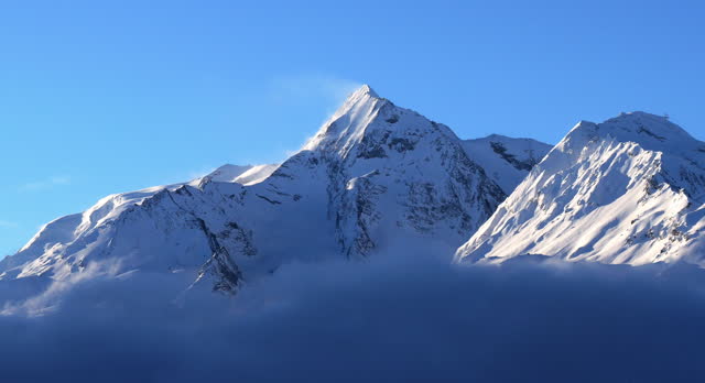 Sunrise over the Mont Pourri and Aiguille Rouge from La Rosiere, Savoie, France.