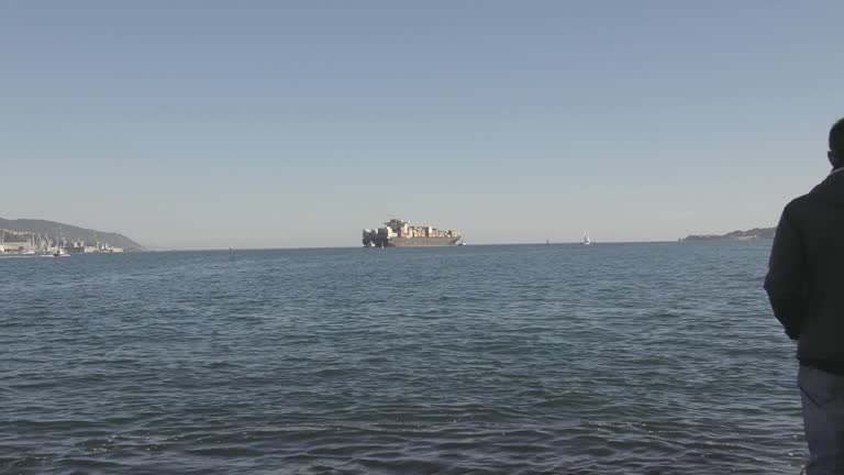 a big container ship Manoeuvring in the gulf of la spezia