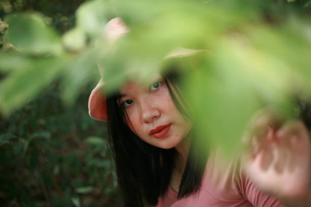 short thai woman in pink