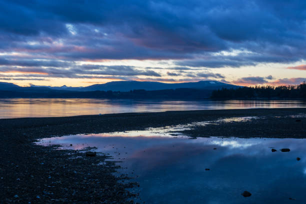 Sunset on Dallas Road in Victoria, BC, with tidal pools.
