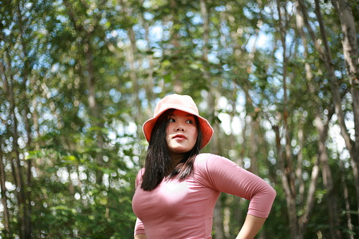 short thai woman in pink