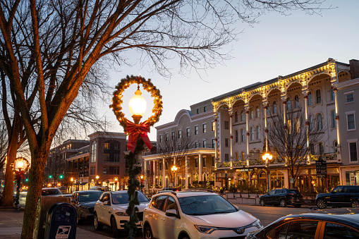 Saratoga Springs, USA - December 22, 2023. Street view of downtown Saratoga Springs in holiday evening, New York, USA