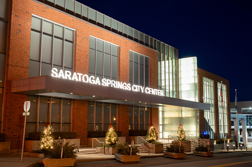 Saratoga Springs, USA - December 22, 2023. Saratoga Springs City Center at night, New York, USA