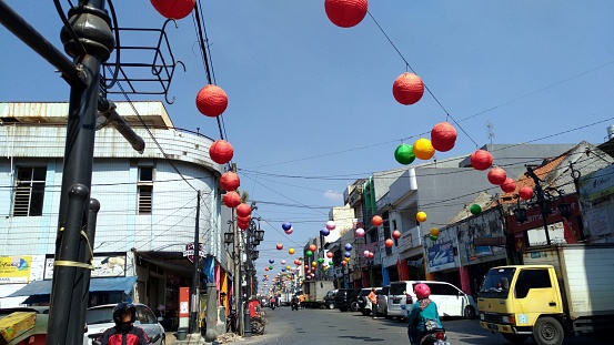 Bandung, Indonesia - September 16, 2017 : Chinese lantern hanging at Cibadak Street. Cibadak is famous for wholesale shops selling all kinds of products, also known as little chinatown in Bandung.