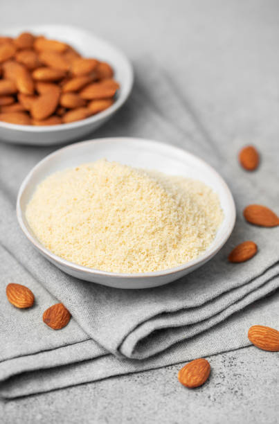 istock Fresh almond flour in a  bowl and almonds 2014359999