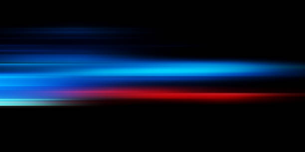 Glowing stripes. Beautiful flashes of light on a dark background. Glowing abstract sparkling background with light effect