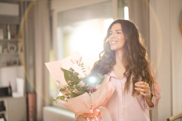 Woman with spring flowers portrait