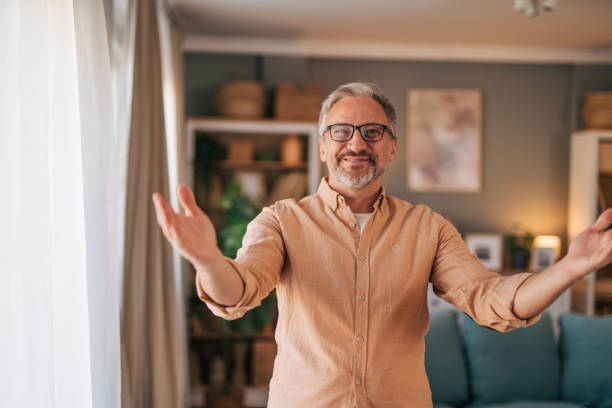 istock close up portrait of a mature explaining something. 2014543105