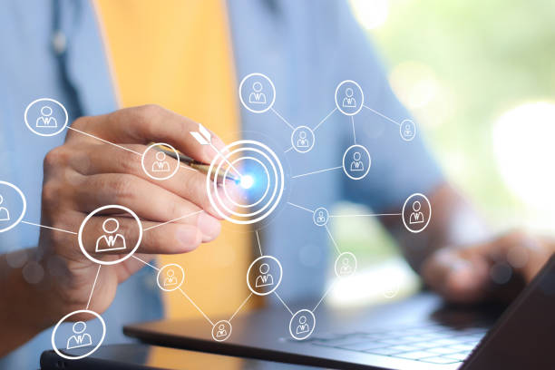 istock White dartboard and White arrow connection linkage with human icon for customer focus target group and customer relation management concept. 2014558808
