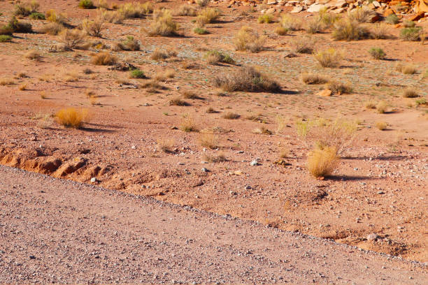 Sandy road of red sand in the mountains