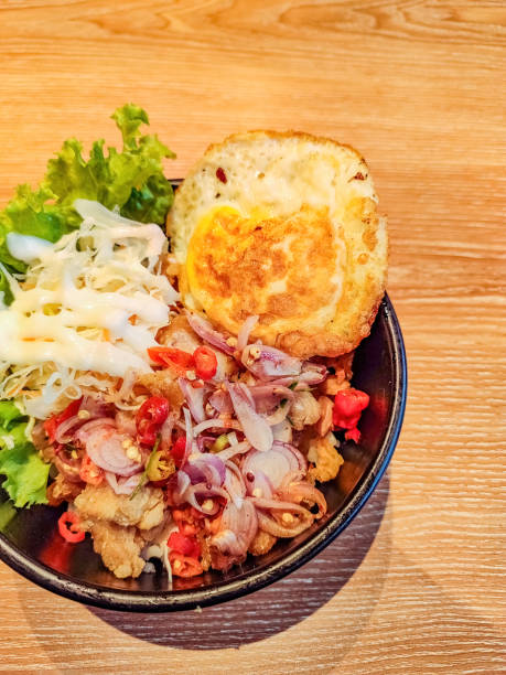 istock a portion of sambal matah rice bowl with salad vegetables and eggs 2014605306