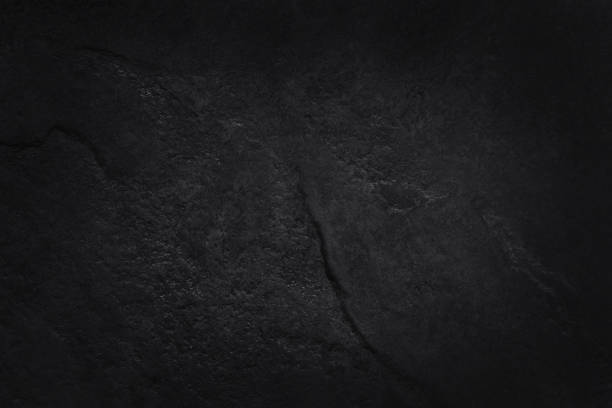 istock Dark gray black slate stone wall texture background in natural pattern for decorative interior and exterior. 2014632652