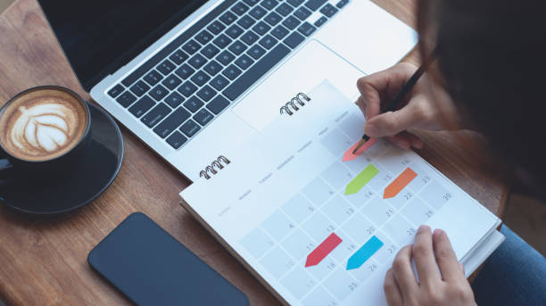 2024 Event planner timetable agenda plan on schedule event. Business woman checking planner, taking note on calendar desk on office table. Calendar event plan, work planning 2024 Event planner timetable agenda plan on schedule event. Business woman checking planner, taking note on calendar desk on office table. Calendar event plan, work planning 2024 30 stock pictures, royalty-free photos & images