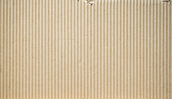 Brown paper box or Corrugated cardboard sheet texture can be use as background