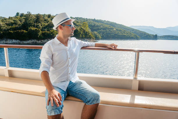 istock Young Man Looking At View From The Boat In Parga In Greece 2014649047