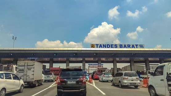 queue of vehicles at a Trans Java toll gate, Indonesia, 31 January 2024.