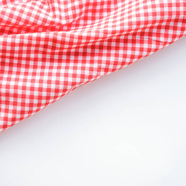 istock crumple pink plaid fabric or classic tablecloth on white background with copy space 2014666065
