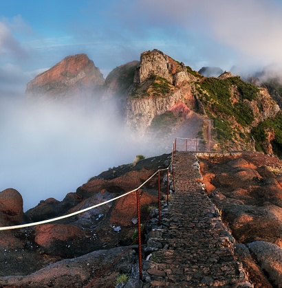 Mountain landscpape at sunrise over clouds in Madeira Island, Pico Arieiro, Portugal