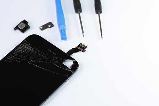 The smartphone was damages and need to repair  which tools smartphone that stand isolated on white background