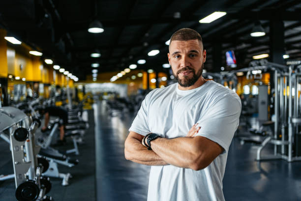 istock Young Muscular Man At The Gym 2014730531