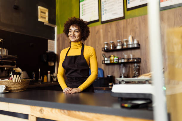 istock Woman working in small coffee shop 2014732103