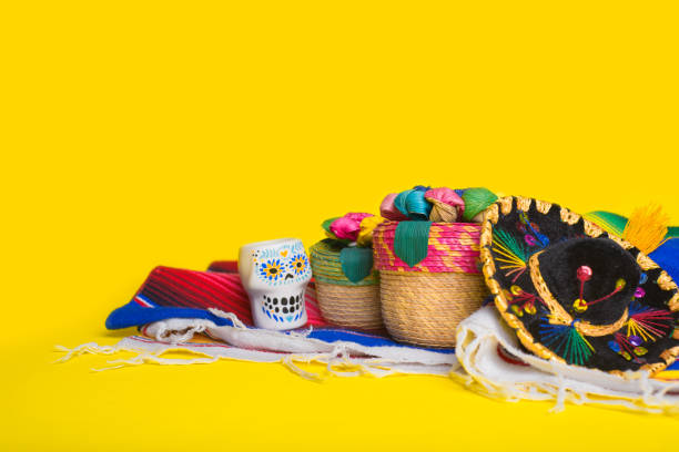 istock Cinco de Mayo festive background. Mexican handicrafts on yellow background. 2014822633