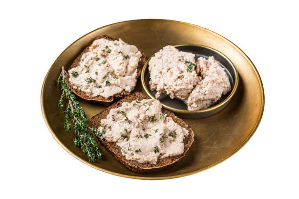 istock Toasts with Cod liver Spread pate on a plate.  Isolated on white background.  Top view. 2014861041