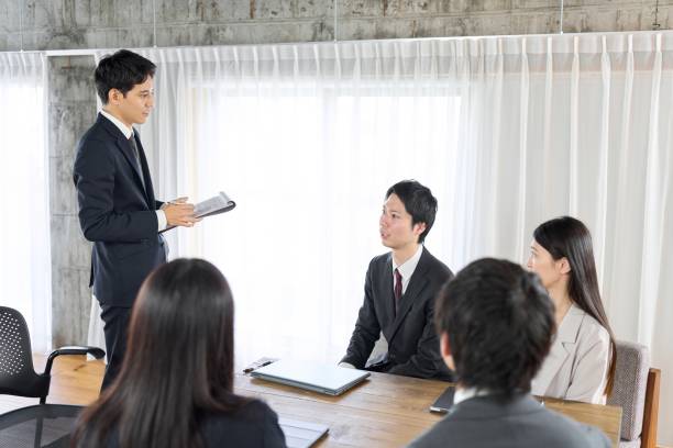 istock Businessman training new employees in the office 2014868546