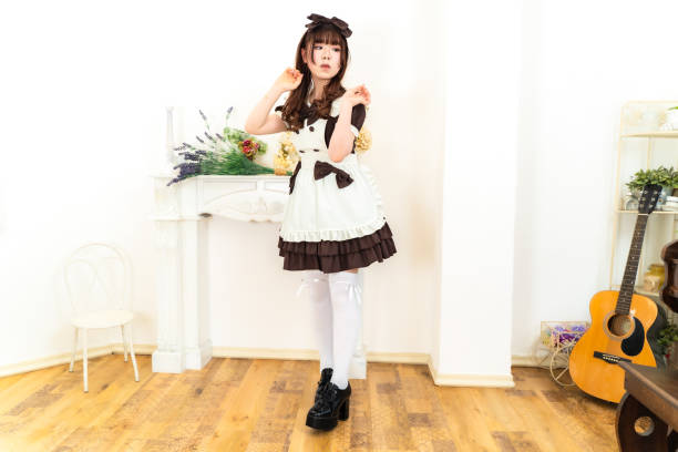Cute woman in maid uniform Cute woman in maid uniform cute femboy in maid outfit stock pictures, royalty-free photos & images