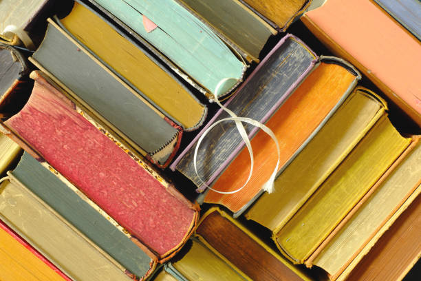 istock Flat lay with multicolored vintage books. Back to school,education,reading, learning, book fair, home office concept. Close up shot. 2014879020