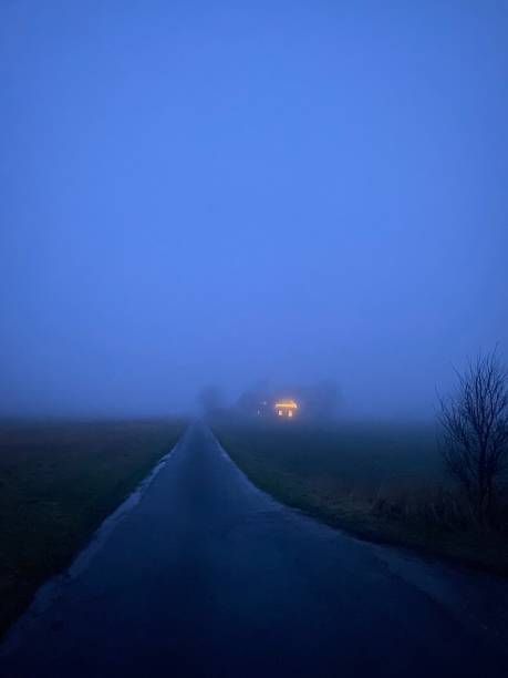 istock The way forward in winter fog and dusk. 2014896368
