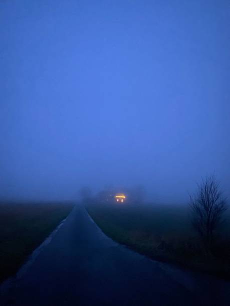 An illuminated houseon it`s own.