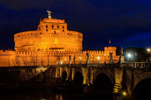 Rome, Italy - March 2, 2023: Night view of Mausoleum of Hadrian, known as Castel Sant Angelo (Castle of the Holy Angel) in Rome, Italy