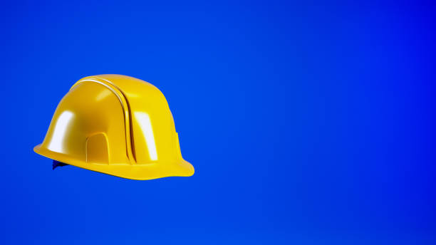 istock Hard hat isolated on white. 3d render. Yellow helmet for Labour Day concept 2014944371