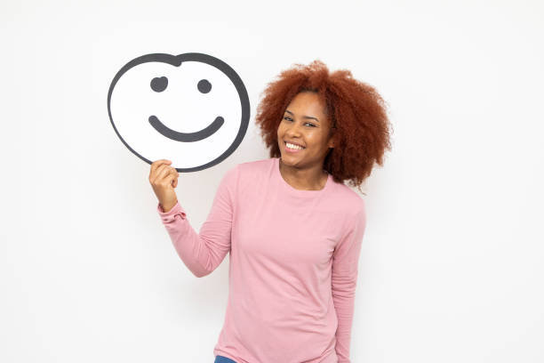 Funny smiley face on pink background. Positive mood. Empty text space