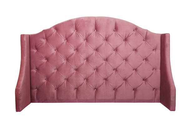 istock Pink velvet bed headboard isolated on white 2015046973